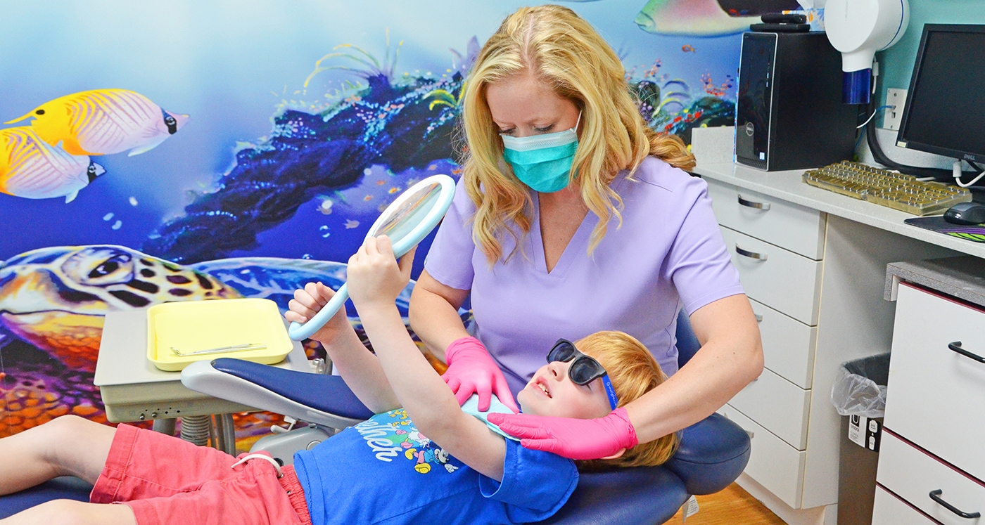 dentist working with patient